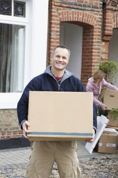 Removal team helping with a home move in Islington street setting