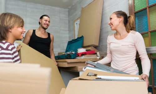 Removal team planning a move in an Islington street with flats and parking restrictions