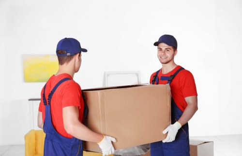 Commercial movers relocating office furniture in Islington