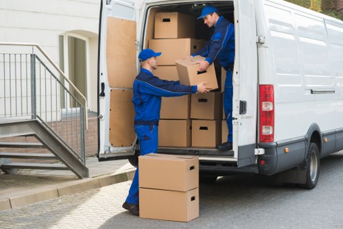 Careful furniture handling during a house move in Islington