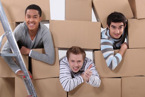 Loading household furniture into a local moving van