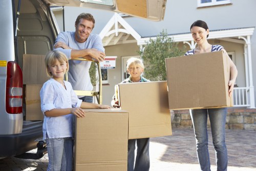 Packed boxes and furniture ready for a removals service in Islington