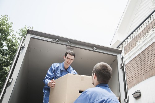 Packed boxes and furniture for a removal van job