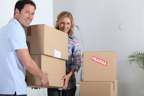 Professional movers handling a flat move in a period building in Islington